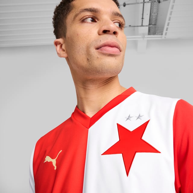 PUMA Mens SK Slavia Praha 24/25 Home Jersey PRODUCT STORY: Gear up and show your allegiance to SK Slavia Praha with the official 24/25 Home Jersey. Designed for performance, it features moisture-wicking dryCELL tech and strategically placed mesh inserts to keep you feeling cool and comfortable. FEATURES & BENEFITS: dryCELL: Performance technology designed to wick moisture from the body and keep you free of sweat during exercise; As part of the RE:FIBRE program, this garment is made of at least 95% recycled material from textile waste and other used materials. DETAILS: Regular fit; 170 gsm, Jacquard; Mesh inserts; Polo style neck; Short sleeves with flat-knit cuffs; Official team branding.