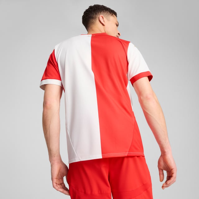 PUMA Mens SK Slavia Praha 24/25 Home Jersey PRODUCT STORY: Gear up and show your allegiance to SK Slavia Praha with the official 24/25 Home Jersey. Designed for performance, it features moisture-wicking dryCELL tech and strategically placed mesh inserts to keep you feeling cool and comfortable. FEATURES & BENEFITS: dryCELL: Performance technology designed to wick moisture from the body and keep you free of sweat during exercise; As part of the RE:FIBRE program, this garment is made of at least 95% recycled material from textile waste and other used materials. DETAILS: Regular fit; 170 gsm, Jacquard; Mesh inserts; Polo style neck; Short sleeves with flat-knit cuffs; Official team branding.