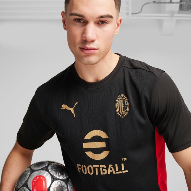 PRODUCT STORY: Perform like the pros in this AC Milan training top. Built for action, it features strategic mesh panels and moisture-wicking dryCELL tech to keep you cool, comfortable and dry. The club crest on the chest lets you show your team pride. FEATURES & BENEFITS: dryCELL: Performance technology designed to wick moisture from the body and keep you free of sweat during exercise; Made with 100% recycled material excluding trims & decorations. DETAILS: Slim fit; 170 gsm, Jacquard; Mesh inserts; Crew neck; Short sleeves; Official team branding.