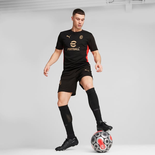 PRODUCT STORY: Perform like the pros in this AC Milan training top. Built for action, it features strategic mesh panels and moisture-wicking dryCELL tech to keep you cool, comfortable and dry. The club crest on the chest lets you show your team pride. FEATURES & BENEFITS: dryCELL: Performance technology designed to wick moisture from the body and keep you free of sweat during exercise; Made with 100% recycled material excluding trims & decorations. DETAILS: Slim fit; 170 gsm, Jacquard; Mesh inserts; Crew neck; Short sleeves; Official team branding.