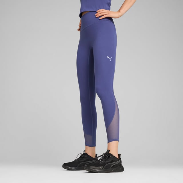PRODUCT STORY: Conquer your workout with ultra-soft 7/8 length tights, featuring CLOUDSPUN fabric for unmatched softness and dryCELL for moisture control. Mesh inserts add flair, while a hidden waistband pocket keeps your valuables safe. Sculpting design lines ensure a flattering fit. FEATURES & BENEFITS: Made with at least 50% recycled materials; dryCELL: Performance technology designed to wick moisture from the body and keep you free of sweat during exercise; CLOUDSPUN: Custom-milled performance poly/spandex blend, this fabric meets the highest performance standards while still feeling like an ultra soft cotton. DETAILS: Tight fit; Interlock fabric; 7/8 length; High rise; PUMA branding details.