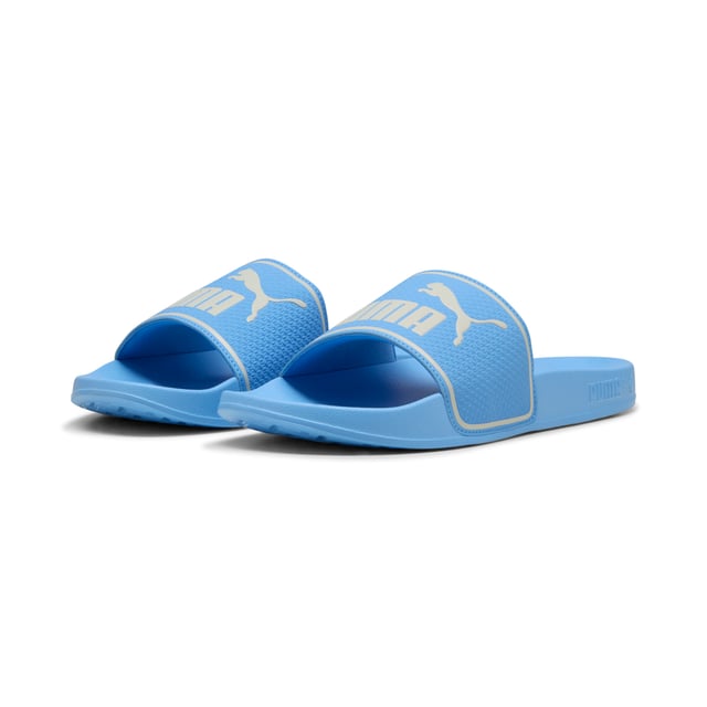 PRODUCT STORY: Step into comfort and style with the PUMA Leadcat 2.0 slide sandals. These cushioned slide sandals feature the iconic PUMA logo, making them a must-have for any sneakerhead. With a lightweight design, these slides are perfect for on-the-go comfort and effortless style. Whether you're hitting the beach or running errands, the Leadcat 2.0 slides will keep your feet feeling comfortable all day long. Upgrade your footwear game with these stylish and functional slide sandals from PUMA. FEATURES & BENEFITS: CMEVA: PUMA's compression-moulded EVA material for lightweight performance. DETAILS: Padded synthetic strap; Moulded CMEVA outsole for grip and durability; PUMA branding.