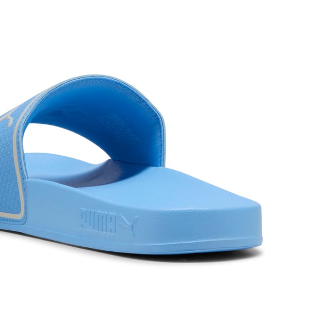 PRODUCT STORY: Step into comfort and style with the PUMA Leadcat 2.0 slide sandals. These cushioned slide sandals feature the iconic PUMA logo, making them a must-have for any sneakerhead. With a lightweight design, these slides are perfect for on-the-go comfort and effortless style. Whether you're hitting the beach or running errands, the Leadcat 2.0 slides will keep your feet feeling comfortable all day long. Upgrade your footwear game with these stylish and functional slide sandals from PUMA. FEATURES & BENEFITS: CMEVA: PUMA's compression-moulded EVA material for lightweight performance. DETAILS: Padded synthetic strap; Moulded CMEVA outsole for grip and durability; PUMA branding.