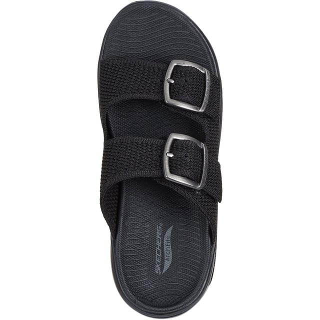 Geniet van ondersteunend casual comfort op warme, zonnige dagen met de Skechers GO WALK Arch Fit 2.0 sandaal. Deze sandaal met dubbele band en gesp heeft een Quick-Dry textiel bovenwerk met lichtgewicht ULTRA GO demping en een Arch Fit voetbed.