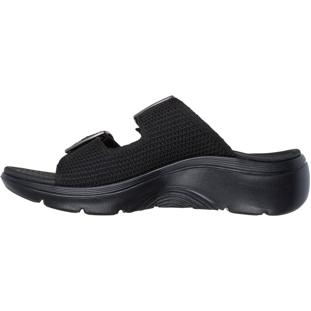 Geniet van ondersteunend casual comfort op warme, zonnige dagen met de Skechers GO WALK Arch Fit 2.0 sandaal. Deze sandaal met dubbele band en gesp heeft een Quick-Dry textiel bovenwerk met lichtgewicht ULTRA GO demping en een Arch Fit voetbed.