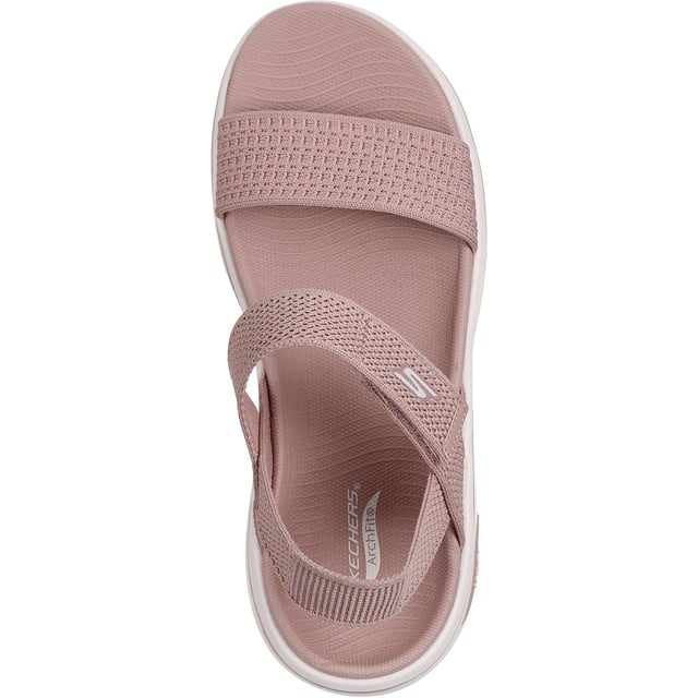 Enjoy supportive casual comfort on warm sunny days with the Skechers GO WALK Arch Fit 2.0 sandal. This knit quarter strap sandal features a textile upper with lightweight ULTRA GO cushioning and an Arch Fit footbed