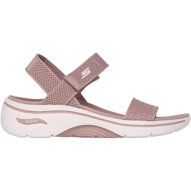 Enjoy supportive casual comfort on warm sunny days with the Skechers GO WALK Arch Fit 2.0 sandal. This knit quarter strap sandal features a textile upper with lightweight ULTRA GO cushioning and an Arch Fit footbed