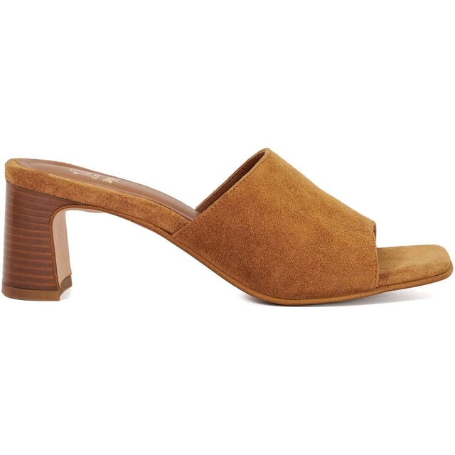 Dune Jule Suede Women's Tan Sandals Slip on Jule a pair of minimalist yet striking mules made from premium fabrics and set on a mid heel. The perfect finishing touch for any outfit whether paired with jeans or dresses they bring a bold retro-inspired edge to your look
