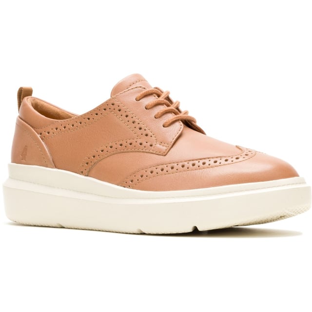 Hush Puppies Joy Leather Women's Tan Brogues Shoes Classic styling meets modern tech with the Joy Wingtip Lace, an ergonomic design with The Body Shoe Flex for natural movement, our super springy Mega Bounce outsole and Bounce footbed for comfort, and made with recycled materials
