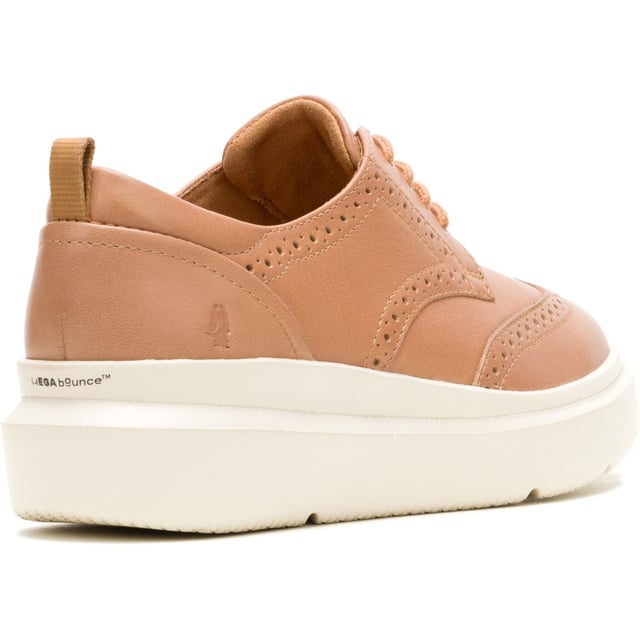 Hush Puppies Joy Leather Women's Tan Brogues Shoes Classic styling meets modern tech with the Joy Wingtip Lace, an ergonomic design with The Body Shoe Flex for natural movement, our super springy Mega Bounce outsole and Bounce footbed for comfort, and made with recycled materials