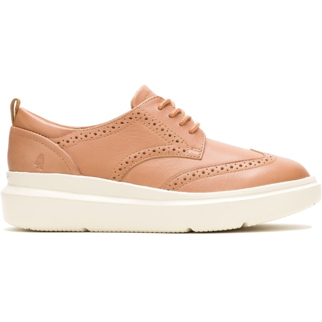 Hush Puppies Joy Leather Women's Tan Brogues Shoes Classic styling meets modern tech with the Joy Wingtip Lace, an ergonomic design with The Body Shoe Flex for natural movement, our super springy Mega Bounce outsole and Bounce footbed for comfort, and made with recycled materials