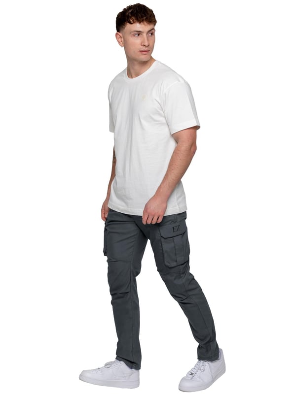Upgrade your everyday style with the Enzo Men's Cargo Pants. Crafted from premium stretch fabric, these lightweight trousers offer a tapered leg fit for a sleek, modern look. Featuring an elasticated waistband with an adjustable toggle, they provide a customizable fit, while the adjustable toggle ankles let you tailor the look and feel. With two side slash pockets, two cargo pockets with secure Velcro fastening, and a single back welt pocket, you’ll have ample storage for essentials. Finished with an Enzo print on the cargo pocket. (649)