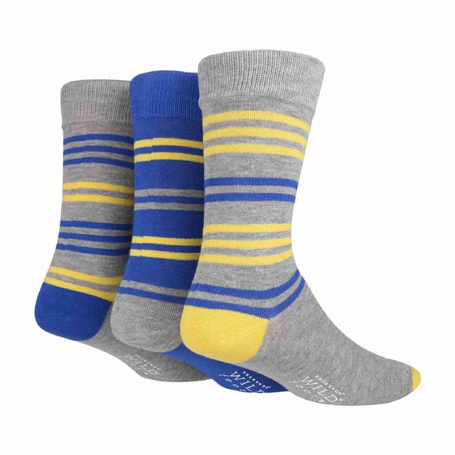 Wildfeet Men’s 3 Pack Patterned Socks: Wild Feet are a great choice if you’re after quality, great colours as well as some funky patterns/designs for your feet. If you’re looking for a softer dress sock with then these are the ideal ones for you!. These socks are made from a rich Viscose from Bamboo material which makes them very breathable, naturally moisture wicking and some of the softest socks you’ll ever wear! There are 3 patterns to choose from: Squares, Stripes, Spots all with a bunch of colour options. These socks would be ideal for everyday wear or for the working day. They could even make a great gift for someone that you know needs an upgrade on their sock drawer with the amazing comfort that they provide. Wild Feet is a range of socks featuring cool designs, bold colours and quirky catchphrases - from pugs and penguins, to lions and llamas! - Choose from a range of styles for men and ladies, from dress to trainer socks. There are even some sporty styles available!. They come in one size Men’s 6-11 UK, are made from 70% Viscose Bamboo 28% Polyester 2% Elastane and come in 10 different styles. They are machine washable. Extra Product Details: Men’s 3 Pack Jacquards Socks Viscose Bamboo Fibre 14 Pattern Choices Super Soft & Comfy A Great Gift Ideal For Everyday Wear Wildfeet Branded One SIze Men’s 6-11 UK Machine Washable