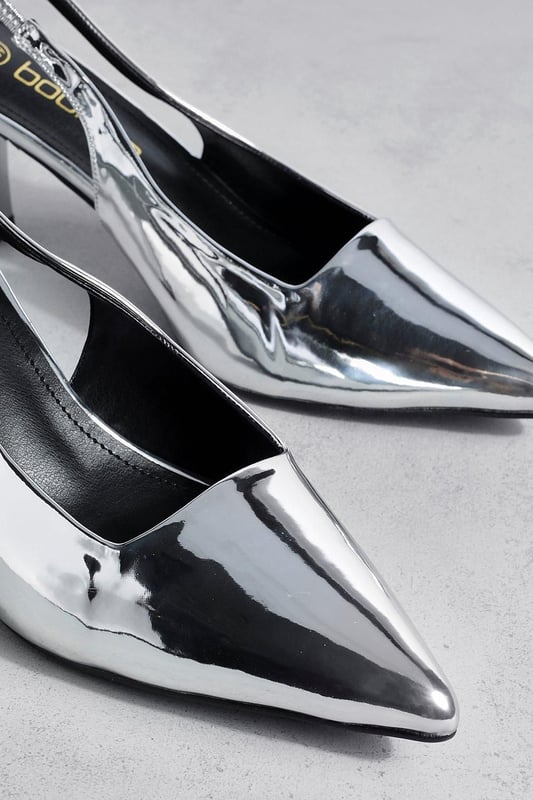New season update. Our court shoes are back and better than ever before. The ultimate shoe for comfort and style, chic is the word and the look this season. With typically no fastening and a medium heel height, who says you can't strut it out in style while working it out in the office? Team a classic black pointed court shoe with a pencil skirt and crisp white shirt, or try an open back option for something a little different.Style: Court ShoesFabric: PU
