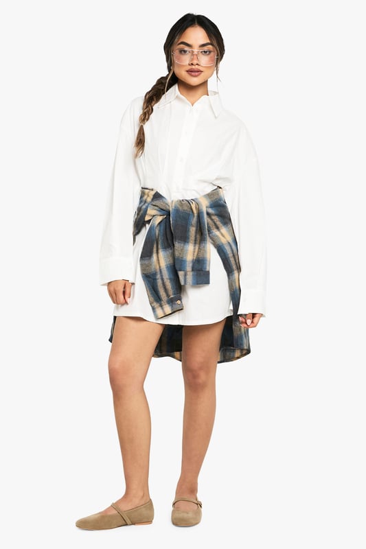 Crafted from soft cotton poplin fabric for all-day comfort and breathability
        Classic collared neckline adds a sophisticated touch to this casual shirt dress
        Distinctive gathered waist detail creates a flattering silhouette
        Versatile button-through design allows for adjustable styling options
        Relaxed long sleeves with cuffs for a polished finish
    
    This shirt dress combines casual comfort with effortless style for your everyday wardrobe. The gathered waist detail creates a feminine shape whilst maintaining the relaxed feel of a classic shirt design. Style with flat loafers and a crossbody bag for university lectures or weekend brunches. For a trendy layered look, take inspiration from our model and add a checked flannel shirt tied around the waist. When the temperature drops, pair with tights, ankle boots and a chunky cardigan for a cosy autumn ensemble. Perfect for family gatherings or casual coffee dates, this Boohoo dress offers the versatility to transition from day to evening with simple accessory changes. The timeless design ensures it will remain a wardrobe staple for seasons to come.