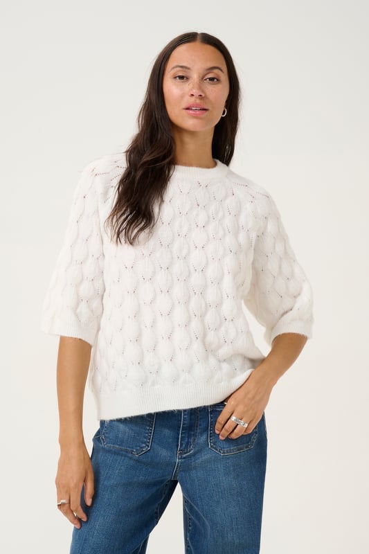 Loose fit,Elleboog lengte  Extra fijne was 30°, niet bleken, niet in de droger drogen, Liggend laten drogen in de schaduw, koud strijken max. 110° C, Droogreiniging  58% Polyester (Gerecycled),20% Polyester,13% Acryl,6% Wol,3% Elastaan