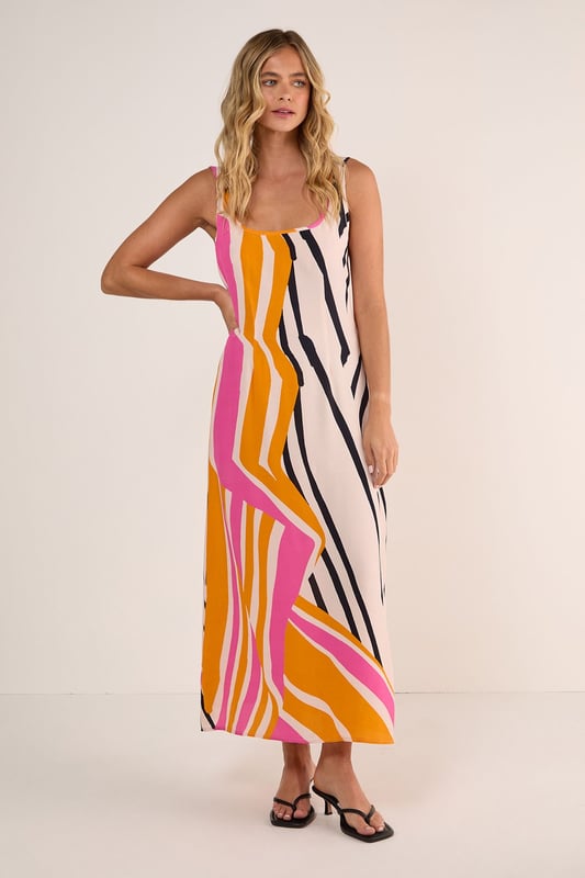 Striking abstract painted stripe pattern for a bold statement piece
        Flattering scoop neckline that frames the dcolletage beautifully
        Flowing maxi length with a relaxed silhouette for effortless movement
        Lightweight viscose Morrocain fabric that drapes elegantly against the body
        Versatile sleeveless design with thin straps perfect for warmer weather
    
    Make a splash at your next daytime gathering in this eye-catching Abstract Painted Stripe Scoop Neck Maxi Dress from Nasty Gal. The artistic stripe pattern creates visual interest whilst the fluid viscose Morrocain fabric ensures a comfortable fit that moves gracefully with every step. Style with simple flip flops as seen on our model for casual brunches, or dress it up with strappy sandals and a denim jacket for family barbecues. The versatile scoop neckline works brilliantly with delicate layered necklaces, while the maxi length offers a relaxed yet put-together look. This dress transitions seamlessly from weekend shopping trips to alfresco dining, making it an essential addition to your warm-weather wardrobe that will turn heads for all the right reasons.