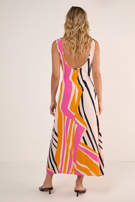 Striking abstract painted stripe pattern for a bold statement piece
        Flattering scoop neckline that frames the dcolletage beautifully
        Flowing maxi length with a relaxed silhouette for effortless movement
        Lightweight viscose Morrocain fabric that drapes elegantly against the body
        Versatile sleeveless design with thin straps perfect for warmer weather
    
    Make a splash at your next daytime gathering in this eye-catching Abstract Painted Stripe Scoop Neck Maxi Dress from Nasty Gal. The artistic stripe pattern creates visual interest whilst the fluid viscose Morrocain fabric ensures a comfortable fit that moves gracefully with every step. Style with simple flip flops as seen on our model for casual brunches, or dress it up with strappy sandals and a denim jacket for family barbecues. The versatile scoop neckline works brilliantly with delicate layered necklaces, while the maxi length offers a relaxed yet put-together look. This dress transitions seamlessly from weekend shopping trips to alfresco dining, making it an essential addition to your warm-weather wardrobe that will turn heads for all the right reasons.