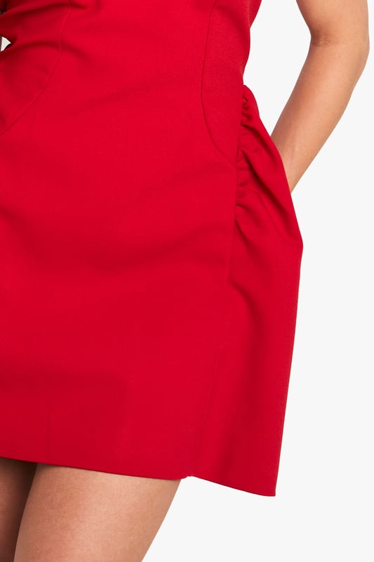 Striking Volumen skater dress with a flattering structured silhouette
        Sleeveless design with a chic slash neckline for a contemporary look
        Distinctive side pleats create dramatic volume and movement
        Short length perfect for showcasing your legs
        Clean, minimalist design makes it ideal for accessorising to suit your style
    
    Make a bold statement in this eye-catching Volumen skater dress from Boohoo. The architectural silhouette features dramatic side pleats that create stunning volume and movement as you walk, dance, or simply turn heads at your next night out. Style with strappy heels as shown for a classic going-out ensemble, or customise with statement jewellery to reflect your personal flair. This versatile piece transitions effortlessly from drinks with the girls to club nights in the city. The sleeveless cut and slash neckline offer a modern, fresh aesthetic while maintaining a sophisticated edge. Complete your look with a compact handbag and sleek updo for a night of urban adventures where you'll radiate confidence and style.