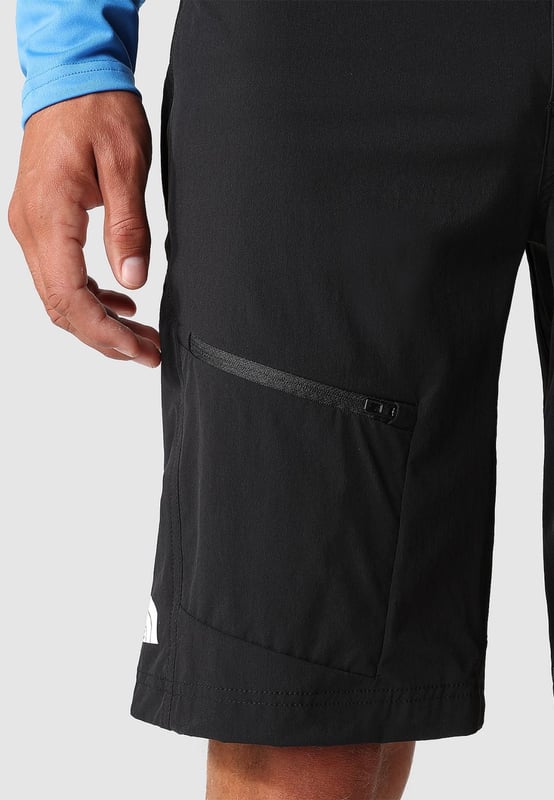 The North Face Men's Speedlight Slim Tapered Shorts are classic softshell all-rounders. - - . Designed for glacier crossing, ridge climbing and other above-the-tree-line alpine activities, they feature a water-repellent treatment to protect you from light showers. - - .  Four-way stretch means you'll be able to move unrestricted when scrambling, and the tough nylon fabric means they can take brushes with rock and other obstacles. - - .  Stash energy bars and other essentials in the leg and side pockets. - - .  Inseam Length: 27 Cm Approx.