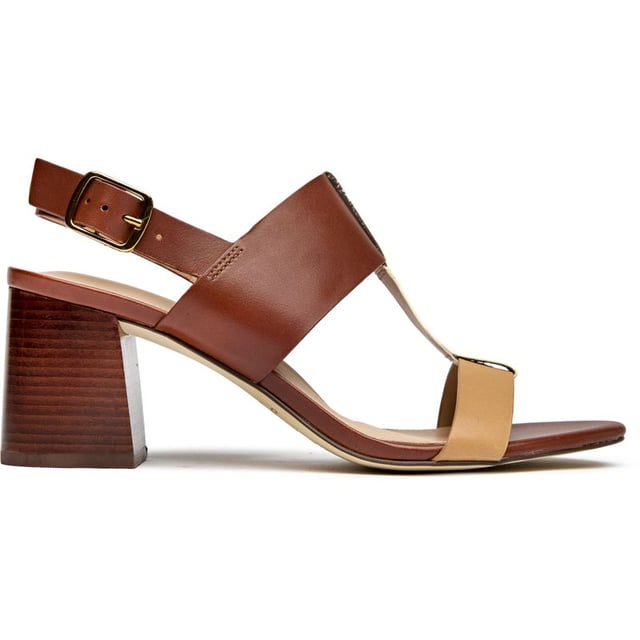 Womens tan Cole Haan josie t-strap sandals, manufactured with leather and a synthetic sole. Featuring: heel height 7cm, buckle closure, cushioned insole and wood veneer edged sole.