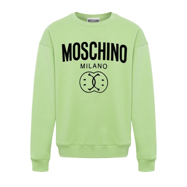Elevate your wardrobe with the Moschino Double Smiley Green Jumper, a vibrant and playful piece that combines comfort with bold style. Crafted from high-quality materials, this jumper features Moschino's iconic double smiley design in a striking green hue, perfect for adding a cheerful touch to any outfit. Its soft fabric ensures all-day comfort, while the eye-catching print makes a confident fashion statement. Ideal for casual outings or relaxed weekends, this jumper effortlessly blends fun and sophistication, making it a must-have addition to your collection. Embrace positivity and stand out with Moschino's unique flair. Made in Portugal, 100% Cotton