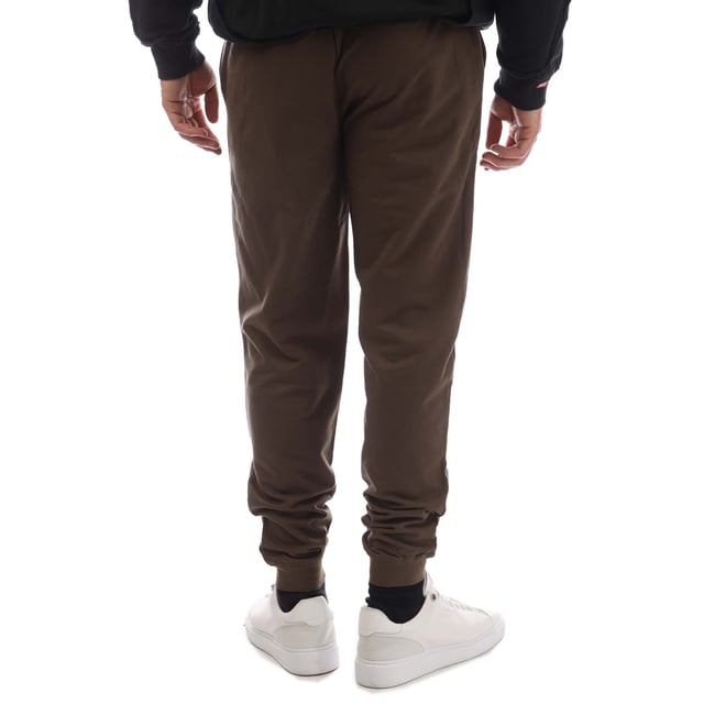 Mens DKNY Everblades Jersey Lounge Pants in green.- Drawstring waistband.- Side pockets.- Logo print.- Ribbed cuffs.- Regular  tapered fit.- 100% Cotton.- Ref: N56858DKYGRN