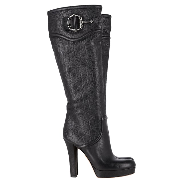 VINTAGE, RRP AS NEW
 Make a bold statement with the Gucci Guccissima Platform Knee-High Boots, crafted in sleek black leather and embossed with the iconic monogram. The dramatic platform and towering heel elevate any outfit—literally and stylistically—while exuding luxury from every angle. **Styling Tip:** Let the boots shine by pairing them with a fitted mini dress or leather skirt for an edgy, fashion-forward look.

Gucci Guccissima Platform Knee-High Boots in Black Leather

Condition: Very good
Signs of wear: Minor markings, Lightly used but very well maintained. Minor mark at soles & creasing, light scuffing at the soles and heels.
Packaging: None
Color: Black
Material: Leather | leather
Size: IT | 38.5
Measurements: Heel height: 120; Insole length: 270
SKU: NAPPUGBSH489764W