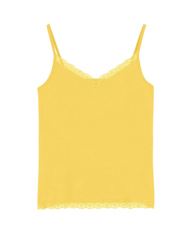 A loose-fitting summer camisole, featuring delicate spaghetti straps which can be adjusted to your shape. Layer under our knitwear range for a touch of femininity, texture and all important pop of colour!