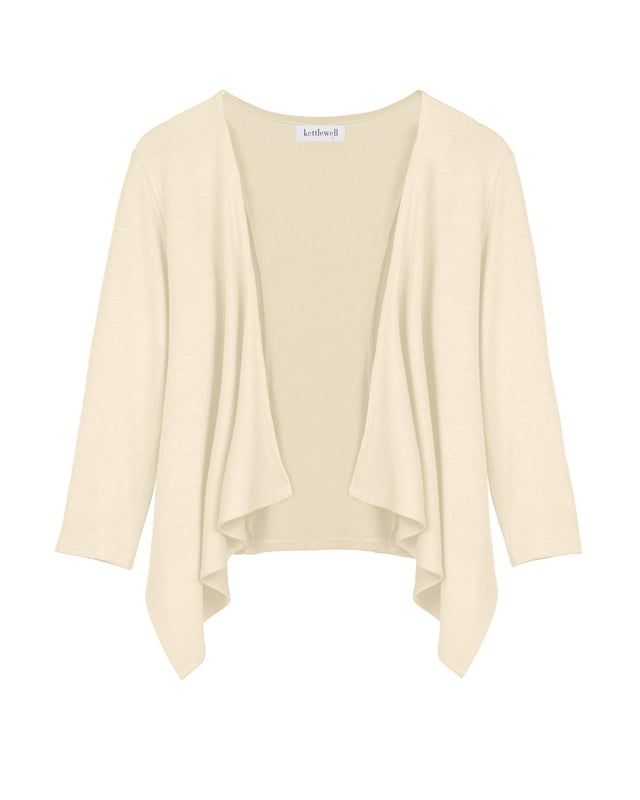 Short Cascade Wrap Lightweight, breathable, dressy; our bestselling Short Cascade Wrap. ¾ length sleeves keep it cool, and combined with the neat length make this summer style perfect for petites.