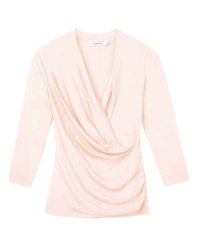 A timeless addition to every wardrobe, crafted from a luxurious fabric blend. This fitted top offers the same flattering silhouette as our popular Camille Crossover, shifted from print into versatile block colours.