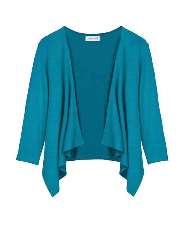 Lightweight, breathable, dressy; our bestselling Short Cascade Wrap. ¾ length sleeves keep it cool, and combined with the neat length make this summer style perfect for petites.