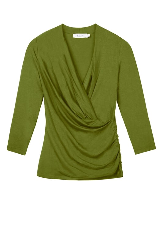 A timeless addition to every wardrobe, crafted from a luxurious fabric blend. This fitted top offers the same flattering silhouette as our popular Camille Crossover, shifted from print into versatile block colours.