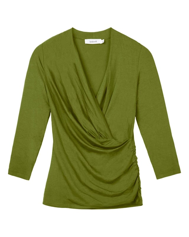 A timeless addition to every wardrobe, crafted from a luxurious fabric blend. This fitted top offers the same flattering silhouette as our popular Camille Crossover, shifted from print into versatile block colours.