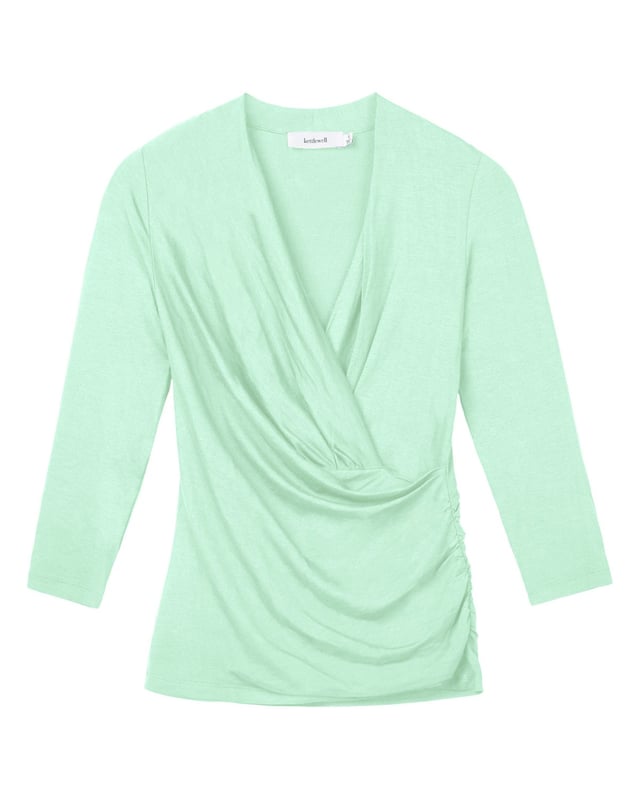 A timeless addition to every wardrobe, crafted from a luxurious fabric blend. This fitted top offers the same flattering silhouette as our popular Camille Crossover, shifted from print into versatile block colours.