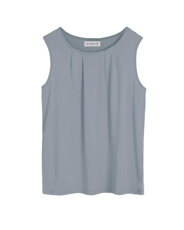 An update to a longstanding favourite in a new fit and fabric to add a breezy feel and an ever so slightly shorter length for ease of tucking in. Featuring delicate pleat detailing along the front neckline for a contemporary look under a jacket