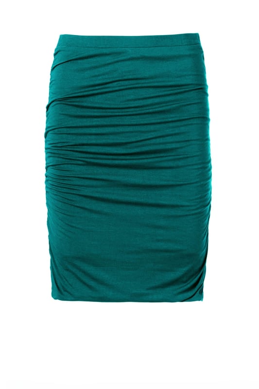 The clever double layer construction of this fitted skirt creates a smooth, figure-enhancing look.