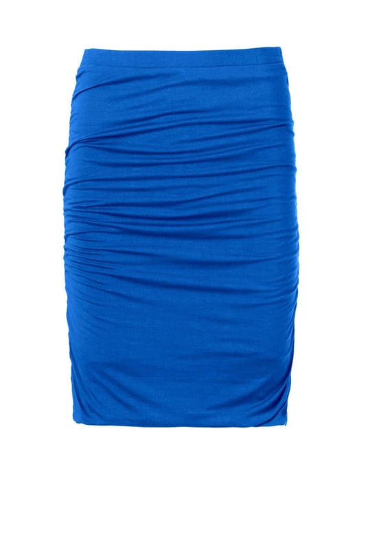 The clever double layer construction of this fitted skirt creates a smooth, figure-enhancing look.