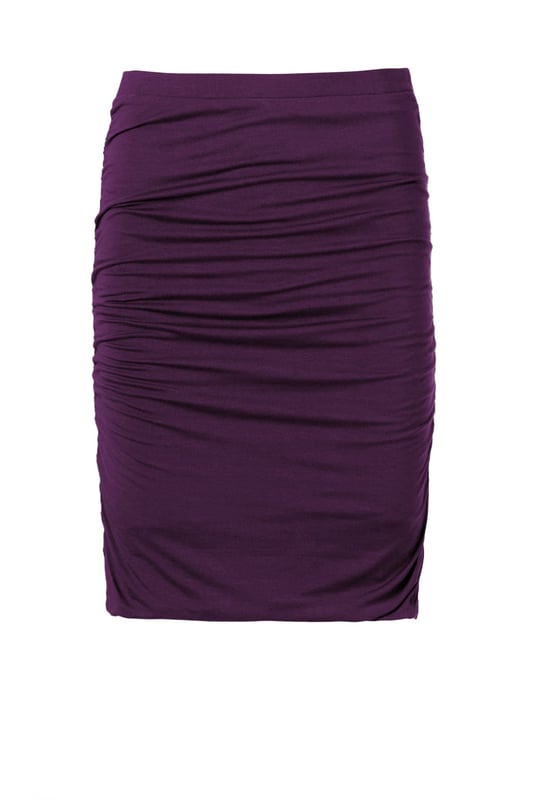 The clever double layer construction of this fitted skirt creates a smooth, figure-enhancing look.
