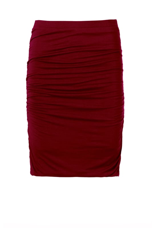 The clever double layer construction of this fitted skirt creates a smooth, figure-enhancing look.