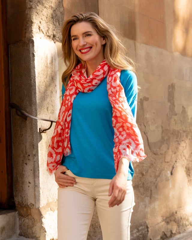 Indulge in effortless elegance with this versatile top crafted from soft viscose slub jersey. The relaxed fit drapes beautifully, creating a flattering silhouette for all body types. Its subtle sheen adds a touch of sophistication, making it perfect for both casual outings and dressier occasions.