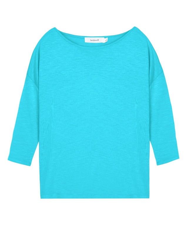Indulge in effortless elegance with this versatile top crafted from soft viscose slub jersey. The relaxed fit drapes beautifully, creating a flattering silhouette for all body types. Its subtle sheen adds a touch of sophistication, making it perfect for both casual outings and dressier occasions.