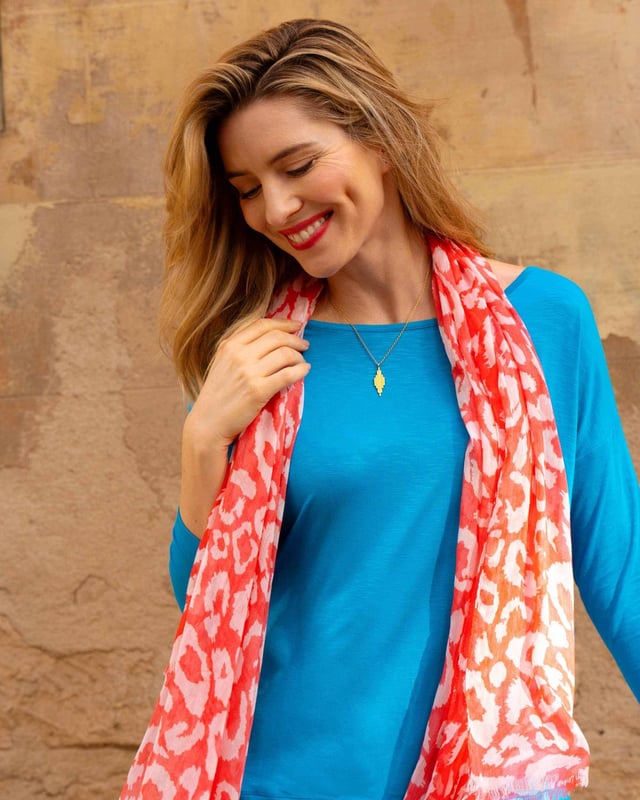 Indulge in effortless elegance with this versatile top crafted from soft viscose slub jersey. The relaxed fit drapes beautifully, creating a flattering silhouette for all body types. Its subtle sheen adds a touch of sophistication, making it perfect for both casual outings and dressier occasions.