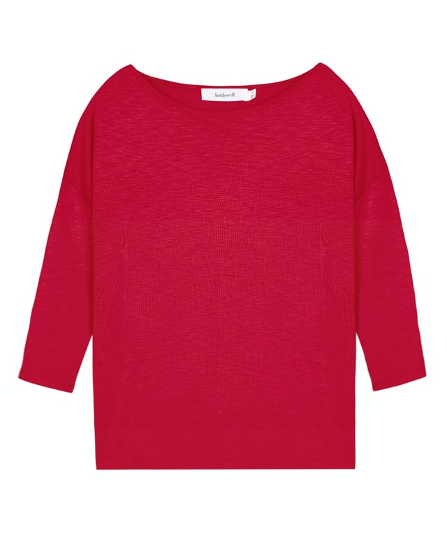 Jenna Top Indulge in effortless elegance with this versatile top crafted from soft viscose slub jersey. The relaxed fit drapes beautifully, creating a flattering silhouette for all body types. Its subtle sheen adds a touch of sophistication, making it perfect for both casual outings and dressier occasions.