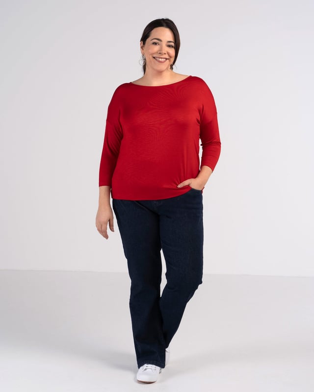 Jenna Top Indulge in effortless elegance with this versatile top crafted from soft viscose slub jersey. The relaxed fit drapes beautifully, creating a flattering silhouette for all body types. Its subtle sheen adds a touch of sophistication, making it perfect for both casual outings and dressier occasions.