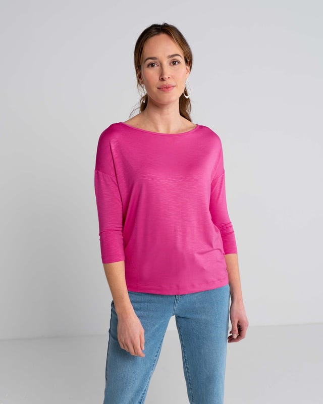 Indulge in effortless elegance with this versatile top crafted from soft viscose slub jersey. The relaxed fit drapes beautifully, creating a flattering silhouette for all body types. Its subtle sheen adds a touch of sophistication, making it perfect for both casual outings and dressier occasions.