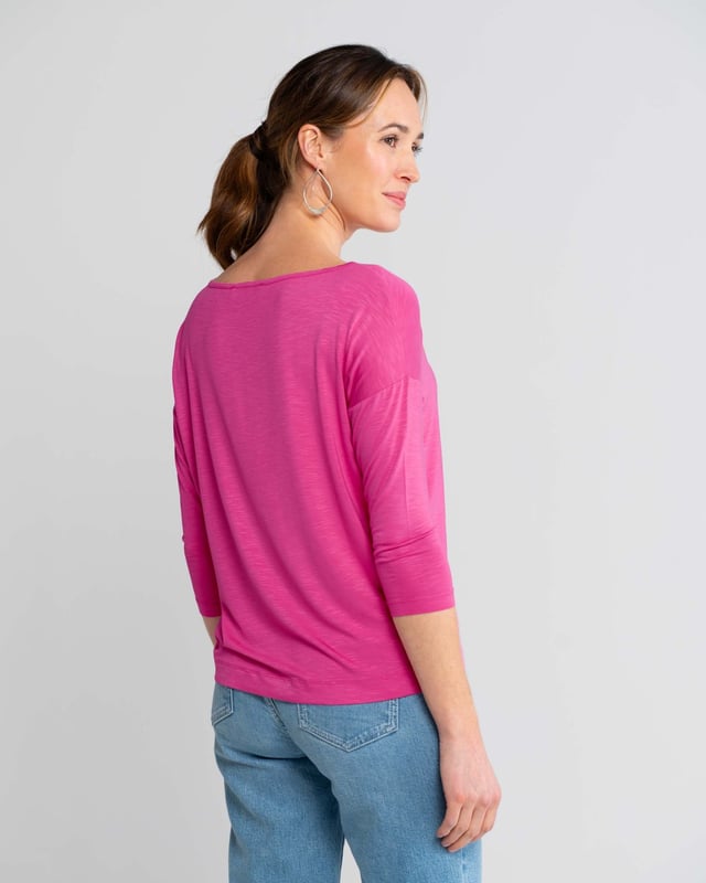 Indulge in effortless elegance with this versatile top crafted from soft viscose slub jersey. The relaxed fit drapes beautifully, creating a flattering silhouette for all body types. Its subtle sheen adds a touch of sophistication, making it perfect for both casual outings and dressier occasions.