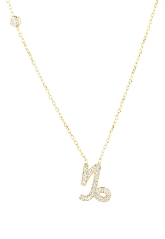 Made of 925 sterling silver, dipped in 22ct gold. This necklace is hand set with multifaceted white zircons.Capricorns celebrate birthdays December 22 - January 19Finished with a lobster clasp, and size adjusterDimensions: Necklace can be worn 40cm chain length or 45cm chain length using adjuster. Motif 1.5cm x 1cmPackaging:This item is presented in a Latelita London signature packagingCare Instructions:To maintain your jewellery, wipe gently with a damp cloth that is soft and clean. Do not soak in water. Avoid contact with soaps, detergents, perfume or hair spray