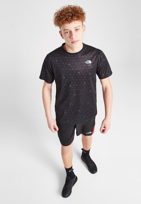 The North Face Geometric Reaxion T-Shirt Junior in TNF Black Upgrade your 'fits with this junior' Reaxion T-Shirt by The North Face. - - . This regular-fit tee is made with a lightweight and breathable poly fabric for easy wear. - -. It features sweat-wicking FlashDry tech for a cool feel, and a crew neckline with short sleeves for a classic cut. - - . Finished up with TNF branding to the chest and reverse shoulder. - -. Machine washable. Size Small Chest pit to pit 38 cms, length 54 cms. - -. Size Medium Chest pit to pit 40 cms, length 55 cms. - -. Size Large Chest pit to pit 42 cms, length 58 cms. - -. Size X-Large Chest pit to pit 46 cms, length 64 cms. - -. Size 2XLChest pit to pit 50 cms, length 71 cms. - -.