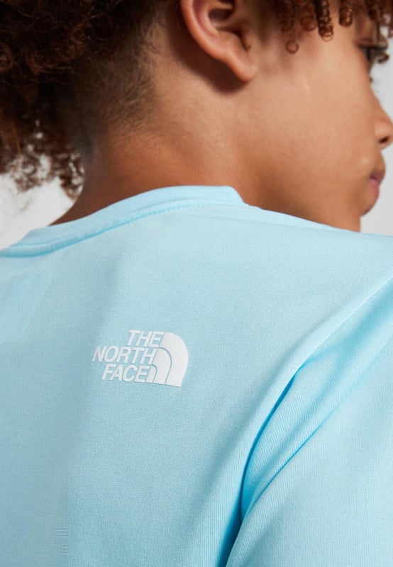 The North Face Reaxion T-Shirt Junior Boys in Atomizer Blue Upgrade your 'fits with this junior' Reaxion T-Shirt by The North Face. - - . This regular-fit tee is made with a lightweight and breathable poly fabric for easy wear. - -. It features sweat-wicking FlashDry tech for a cool feel, and a crew neckline with short sleeves for a classic cut. - - . Finished up with TNF branding to the chest and reverse shoulder. - -. Machine washable. Size Small Chest pit to pit 38 cms, length 54 cms. - -. Size Medium Chest pit to pit 40 cms, length 55 cms. - -. Size Large Chest pit to pit 42 cms, length 58 cms. - -. Size X-Large Chest pit to pit 46 cms, length 64 cms. - -. Size 2XLChest pit to pit 50 cms, length 71 cms. - -.